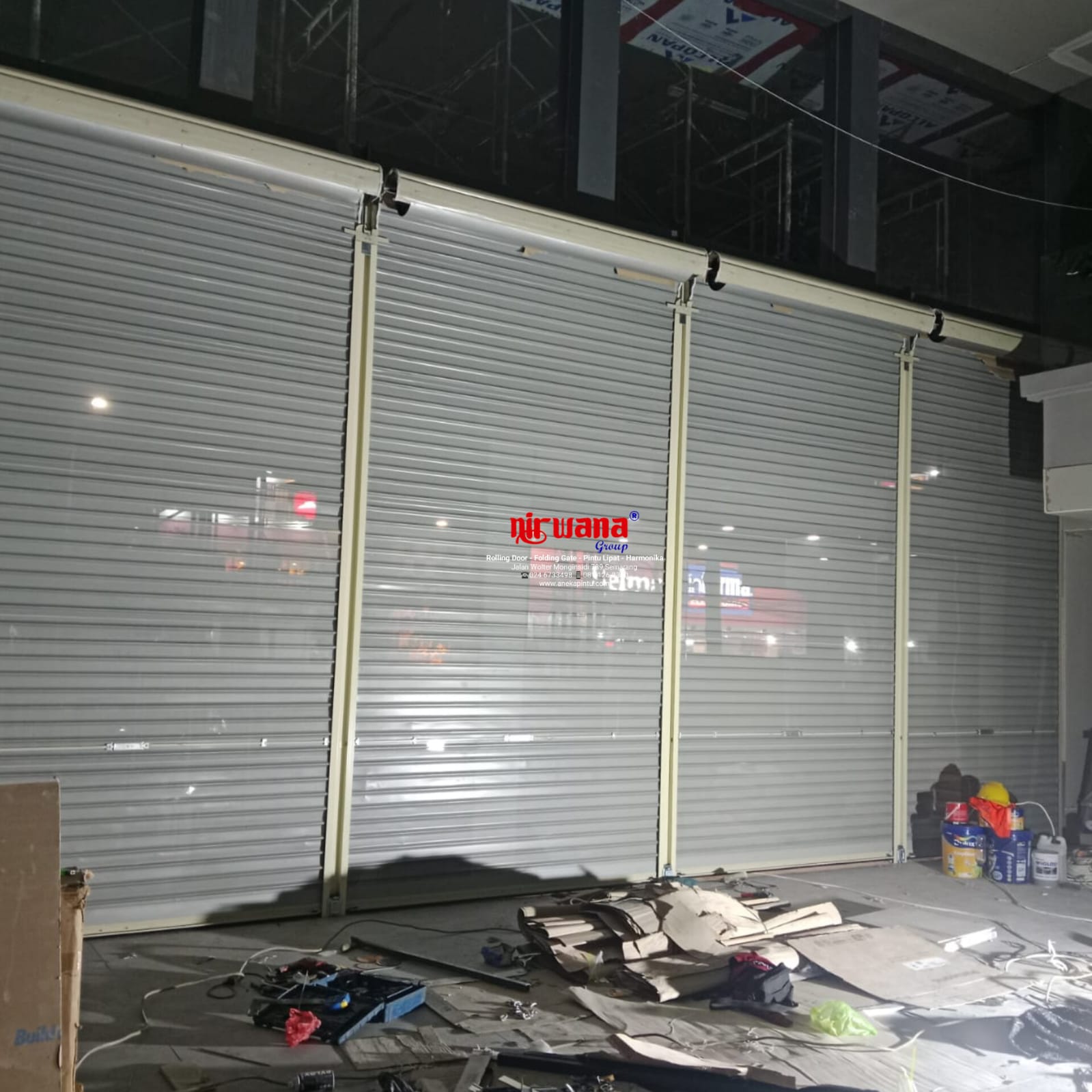Pemasangan Rolling Door One Sheet Full Perforated di Jl Pandanaran Semarang Jawa Tengah