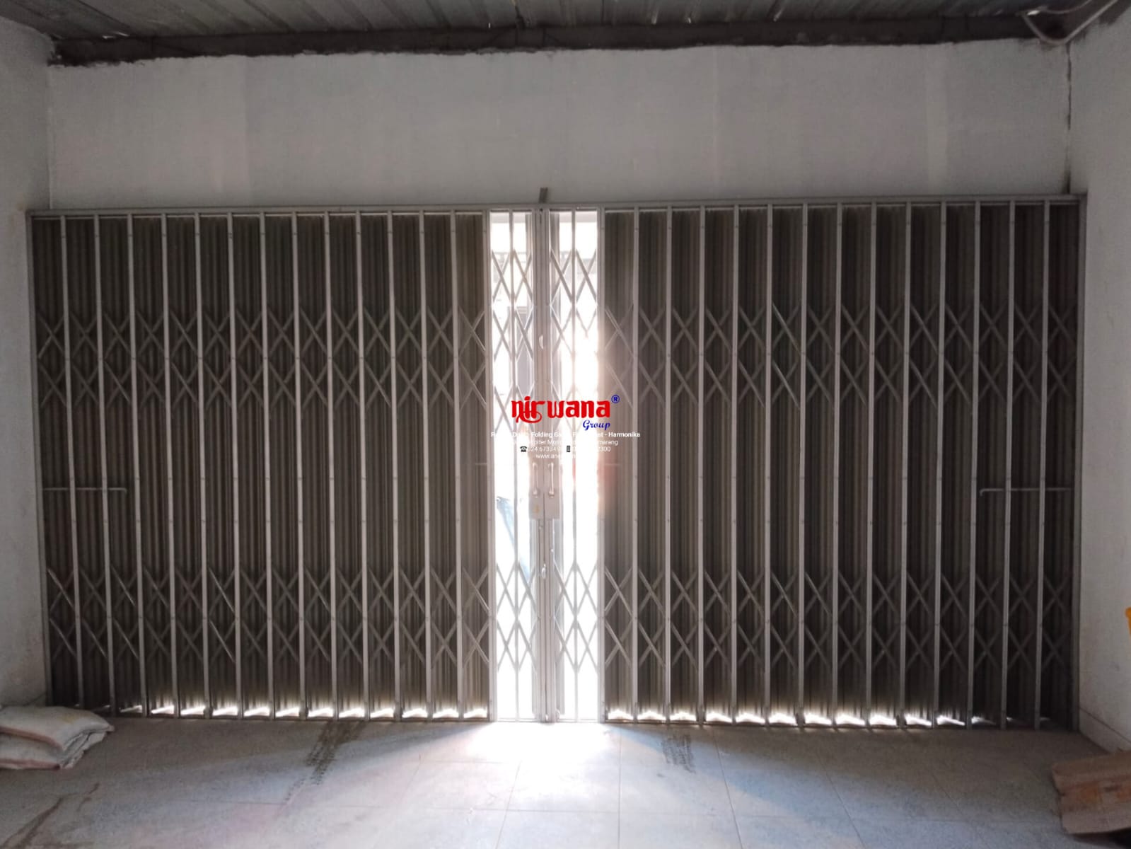 Nirwana Group telah menyelesaikan Pemasangan Folding Gate Premium Ketebalan 0,8mm di Jl. Tlumpak, kota Semarang