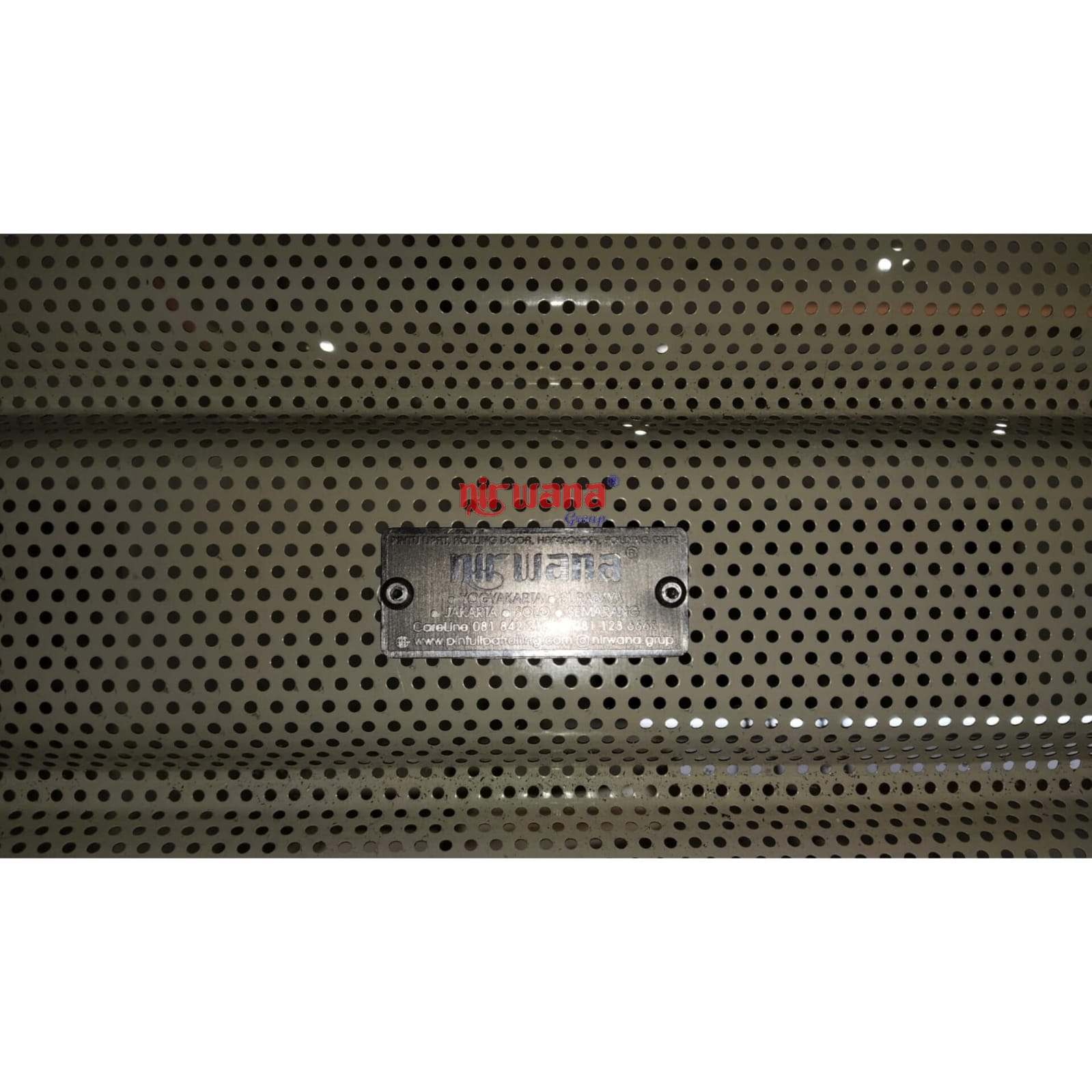 Rolling Door One Sheet Full Perforated di Tenant UBS Gold Bunga Tanjung 23, Mall Semarang.