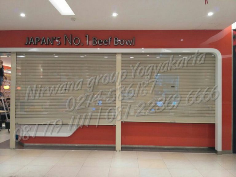 Pemasangan Rolling Door Full Perforated Yoshinoya Transmart Maguwo, Yogyakarta.