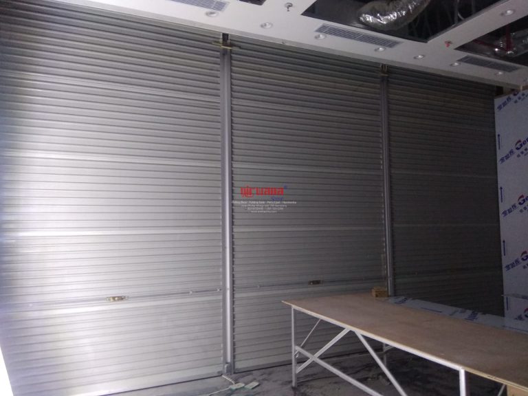 Pemasangan Rolling Door One Sheet Full Perforated di OPPO The Park Mall Semarang